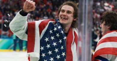 Photographer describes capturing hockey star Jack Hughes’ toothless grin after gold-medal win: “Still in shock”